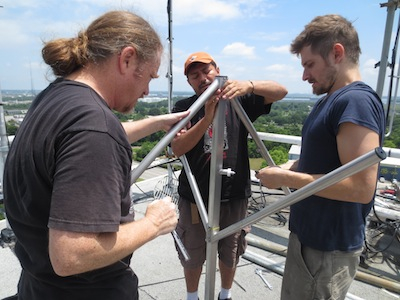 Prometheus engineers and WOHM staff assemble LPFM antenna