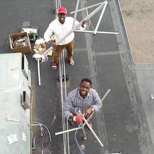 Mahamed and Abdirahman prepare the KALY antenna for installation